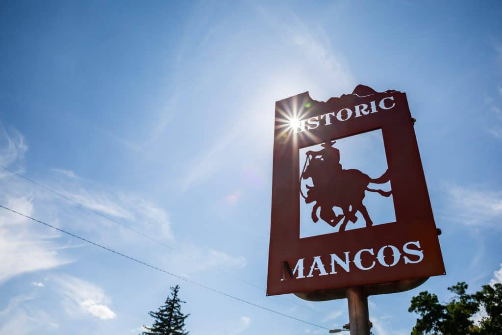 Town sign of Mancos in SW Colorado