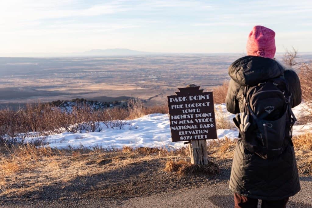 Woman looking out at view from Park Point in Mesa Verde National Park